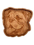 A hand-carved wooden serving tray shaped like a bulldog&