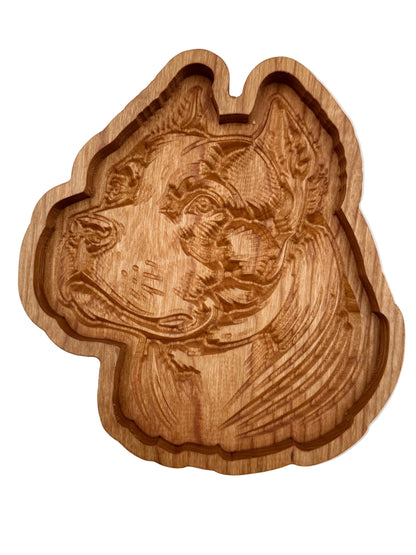 A handcrafted wooden tray shaped like a dog&