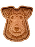 A hand-carved wooden dog head plaque or tray, showcasing detailed wood grain and engravings, set against a plain white background.