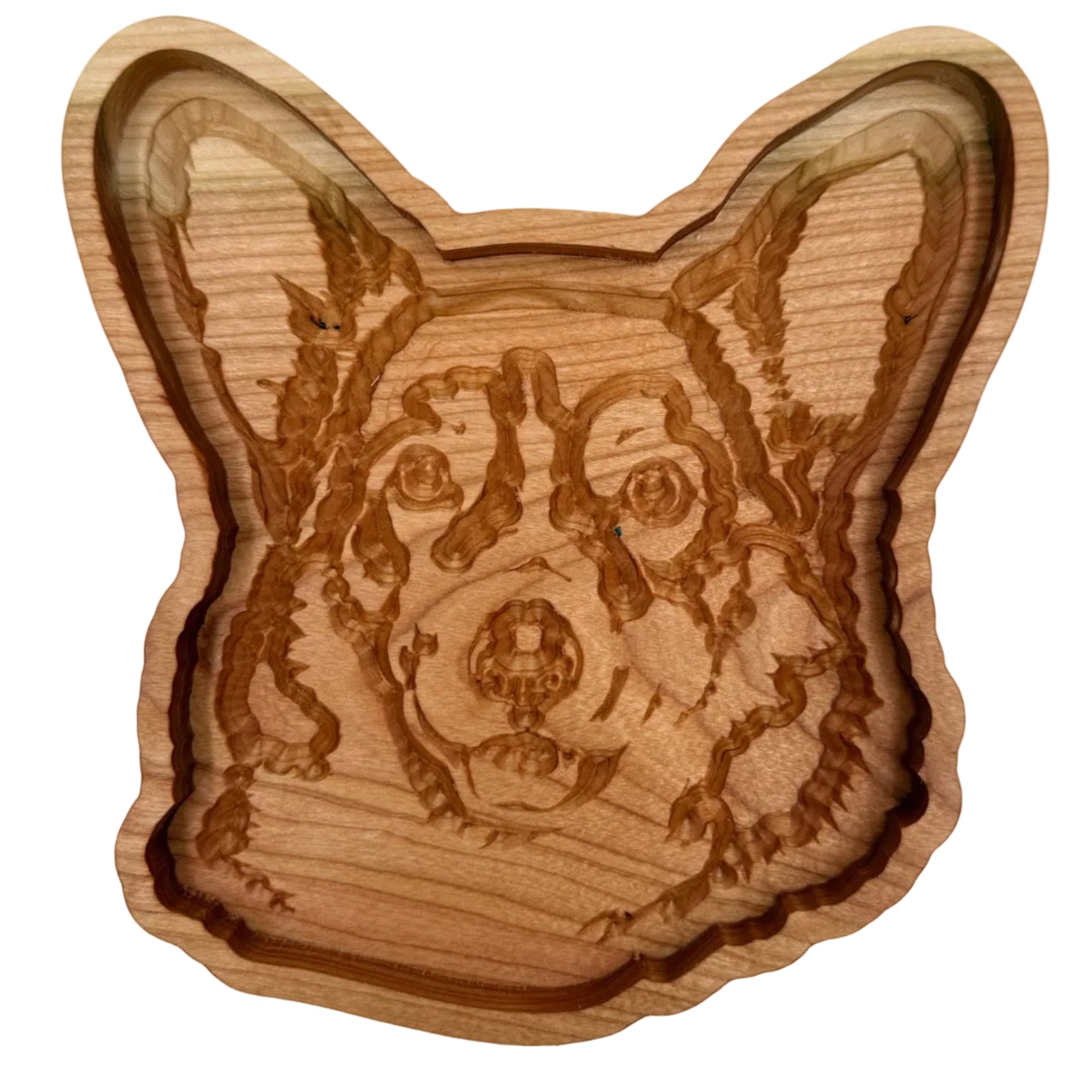 A handcrafted wooden dog head tray with detailed laser-engraved facial features, shown on a plain white background.