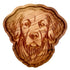 A scalloped wooden serving tray shaped like a dog&