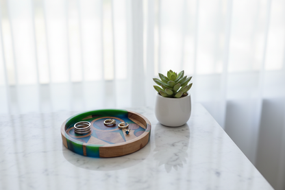 Mosaic Geometry tray on a bathroom vanity with jewelry and succulent
